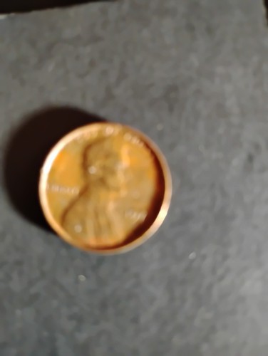 1977 lincoln error cent the coin is a little smaller and thinner struck thruogh