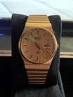 Vintage Seiko SQ 6923-7030 Gold Tone Men's Day/Date 34mm Luminous Faceted Watch