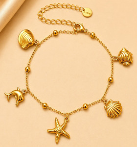 Authentic Tides of Fortune: 18k Gold Plated Cable Chain Sea Life Charms Bracelet