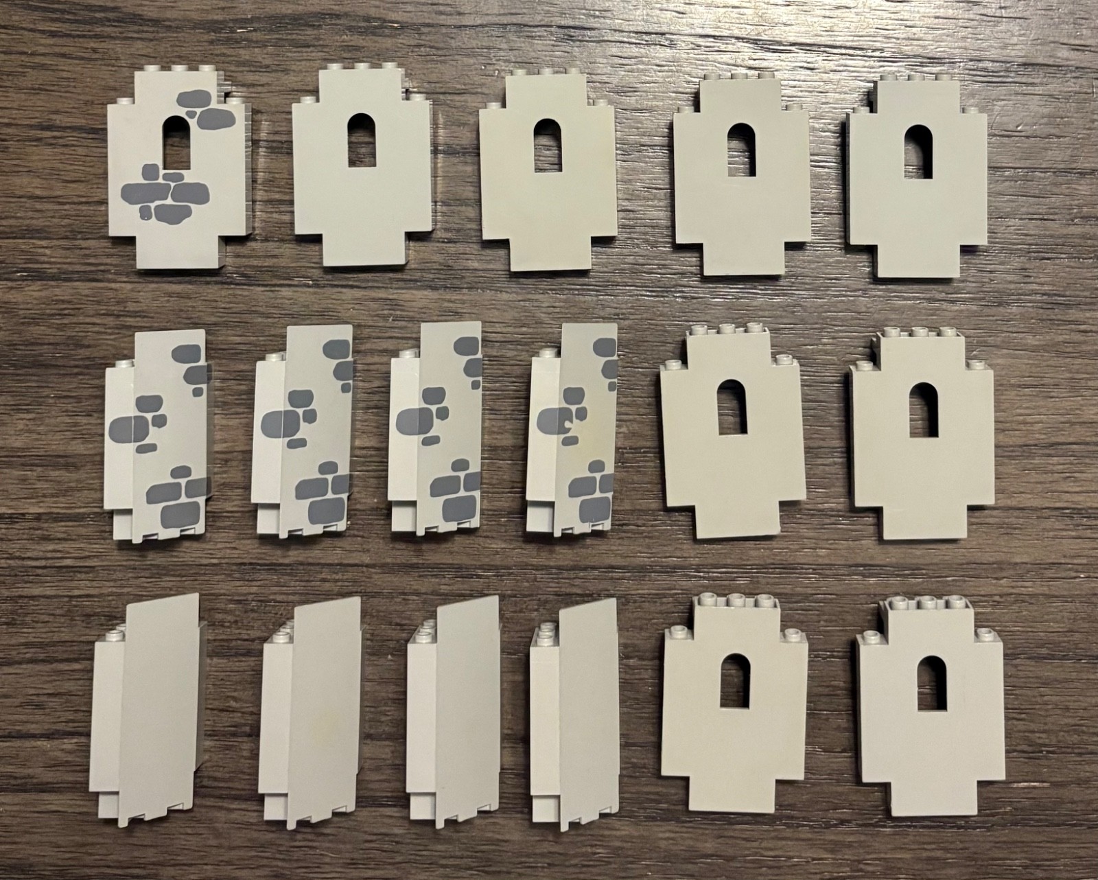 LEGO castle pieces. vintage grey walls, windows, brick accessories