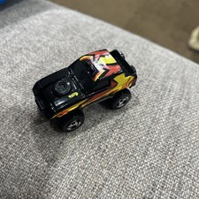 1984 HOT WHEELS GULCH STEPPER JEEP 4X4 NERO 2 1/2" AUTO PRESSOFUSA CON ROSSO E GIALLO