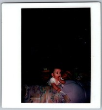 Vtg Polaroid Snapshot Photo Cute Baby Sucking Thumb Dark Background 1980s
