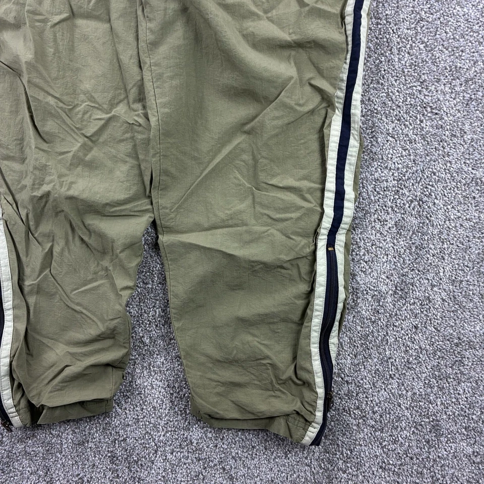 Pantalones deportivos vintage con borde plateado para hombre M verde oliva forrados con cremallera al tobillo a rayas elegantes Foto 3 de 4