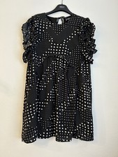  Black & White polka dot dress with tie back & ruffle sleeves Size 10