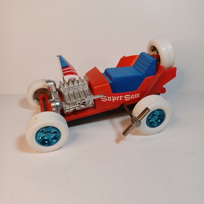 Vintage Japan Durham Ind. Plastic Wind-Up Super Sam Patriotic Toy Car