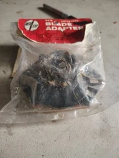 universal lawnmower blade adapter