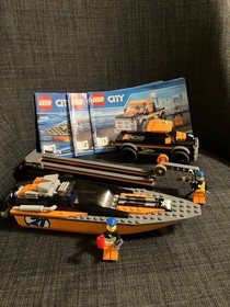 Lego City 4 x 4 with Power Boat. retired set 60085 used complete with instruc.