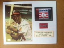 Signed Hank Aaron 5x7 color photo mounted to 8x10 w/coa