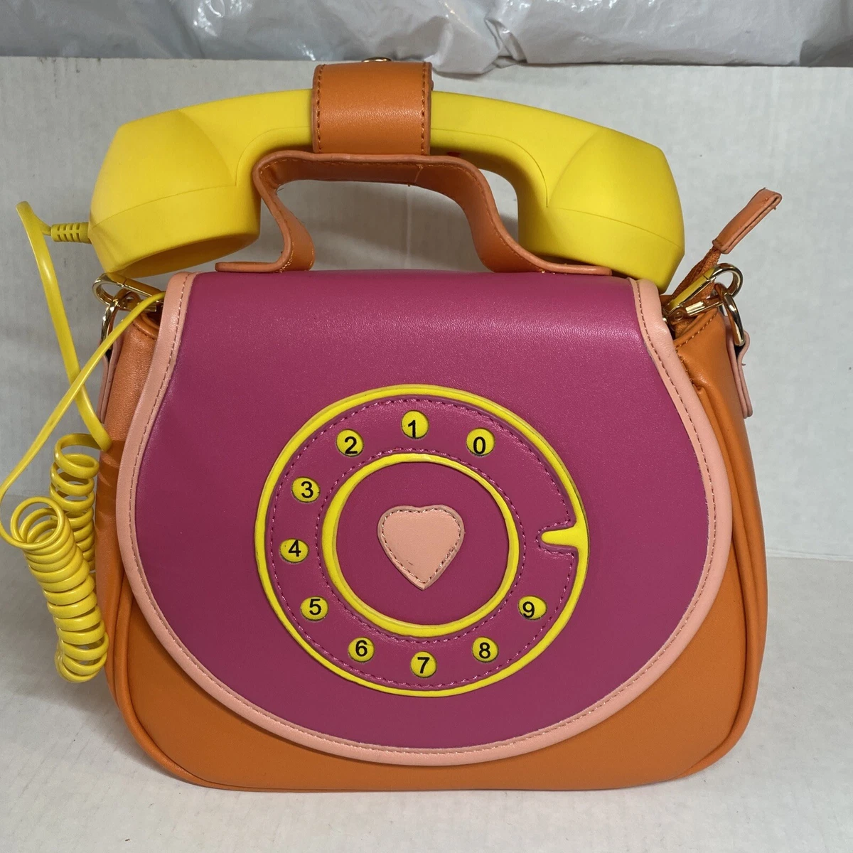 Pink telephone purse sale