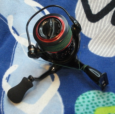 Okuma Ceymar C40 Spinning Fishing Reel 50lb braid fishing line.