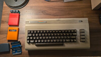 Working commodore 64 computer with box and carts synthesizer kit
