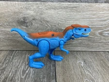 Tyrannosaurus Rex T-Rex Dinosaur Lights Growls Roars Plastic 4” Tall 7.5” Long 