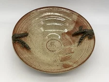 Hand thrown bowl green with brown, peas in a pod on each side