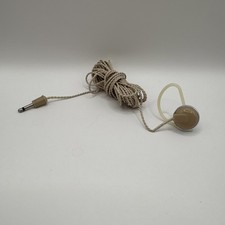 Vintage single earphone with braided cord and 3.5mm jack