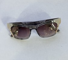 Crystal Marble tone Frame L.A.M.B Sunglasses LA563 54-18-145 B:40 Purple Lens