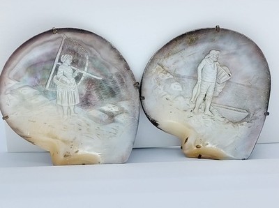 Hand-decorated antique shell  artifacts depicting fishermen and traditional sea