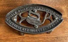 sad iron trivet antique G 