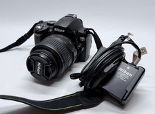 Nikon D60 DSLR Camera + A-FS DX SWM VR 18-55mm 1:3-5.6G Bundle Battery Charger