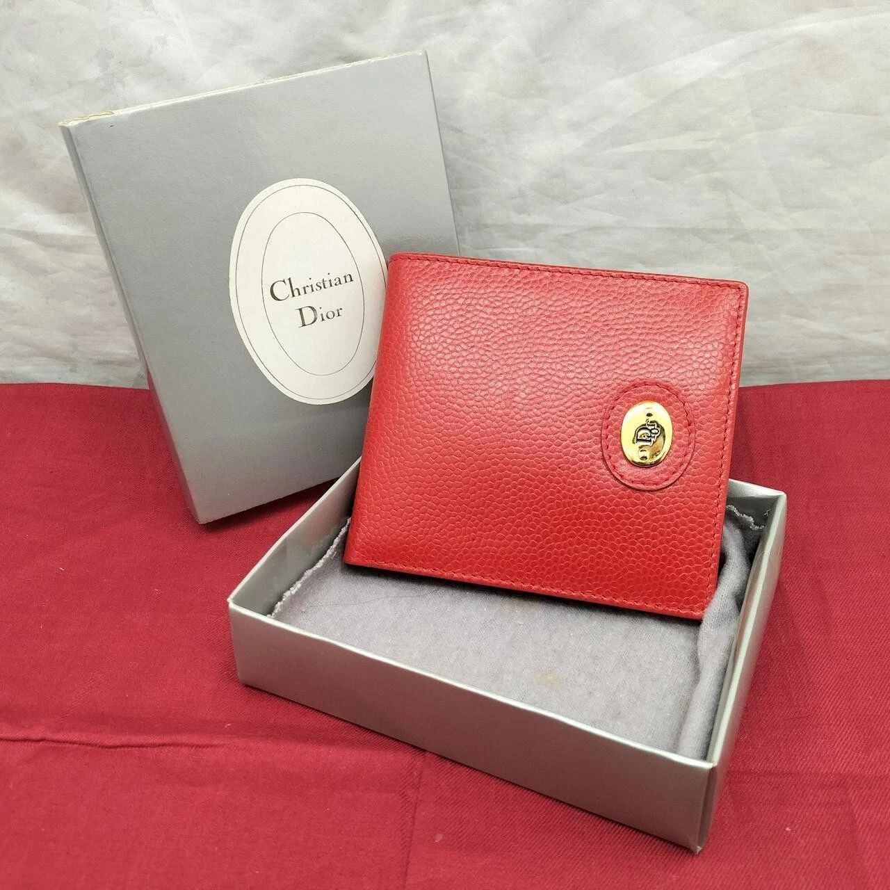 Portefeuille Christian Dior bi pli 9,7 cm or logo Dior quincaillerie du Japon