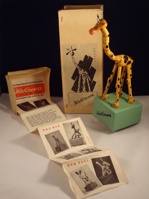 wakouwa girafe en bois ,fonctionne parfaitement