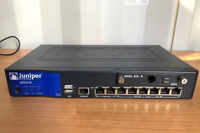 Juniper Networks SRX210H mit ADSL 2/2+ A Karte ohne Netzteil - Juniper SRX210H