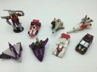 Lot of 8 Vintage Transformer Toys,Small Cars,Rocket,Jet Planes,Robots