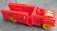 Vintage red plastic fire truck with Hot Rod decals