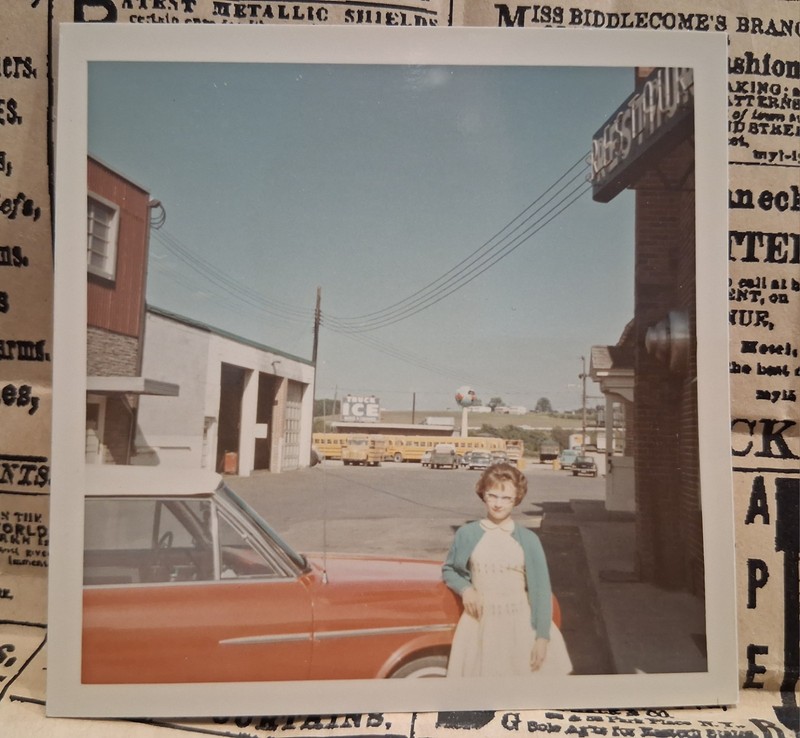 Vintage Color Photo Cute Woman By Red Convertible Signage In Background