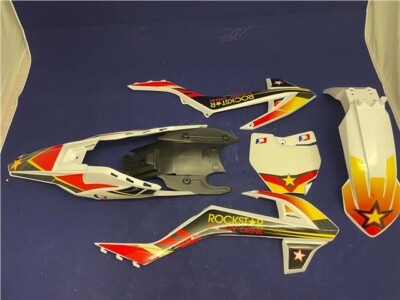 Pit Bike Rockstar auf weiß Kunststoff Verkleidung Set Symoto SYK Modell. KTM 65 Style