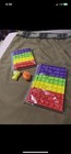 Fidget Pop It pencil case Comes with  strap , 2 Notebooks And 2 Keychains ,new — photo 2