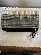 NWT Fabric Fold over Black  White Woven With Sequins Zipper Clutch Tassels