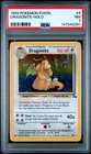 1999 POKEMON FOSSIL #4 DRAGONITE-HOLO PSA 7