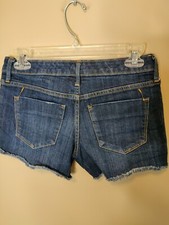 Mossimo women's 0 - 28"W x 4"I actual denim cut-off shorts mid-rise midi dark