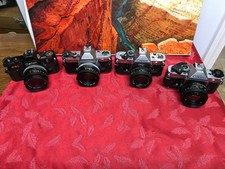 Lot of 4 Canon  AE-1, AE-1 Program 35mm SLR Film Cameras PARTS or Display