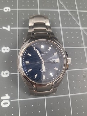 CITIZEN Eco-Drive TITANIUM SAPPHIRE WR 100  E11-S078369   READ PLEASE