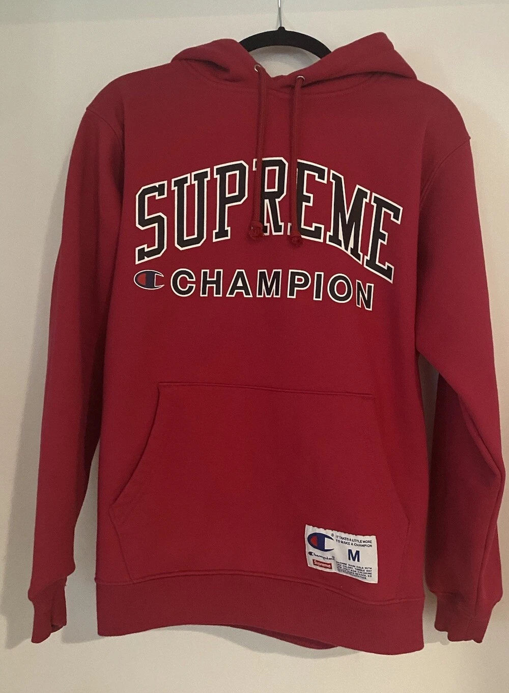 Sweat à capuche homme rose et noir Supreme Champion taille M