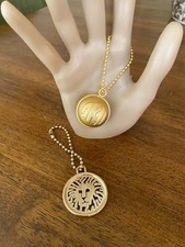 Lote de 2 llaveros Anne Klein Bag Charms bola de león chapada en oro