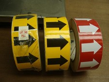BRADY ARROW TAPE ONE FULL ROLL YELLOW, TWO PARTIAL ROLLS YELLOW/RED B946