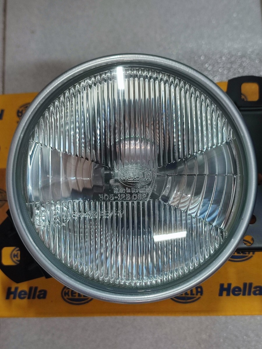 BMW E30 headlight right Euro Hella !!NEW!! OEM 63121373562 