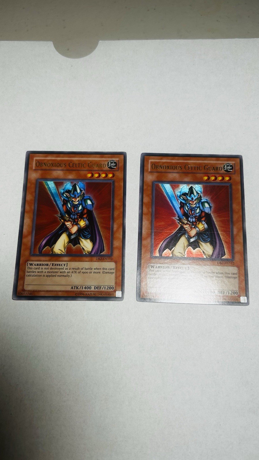 Obnoxious Celtic Guard DB2-EN112 YuGiOh Dark Beginning 2 trading card — raw and PSA graded price guide
