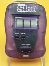 Radica Purple Pocket Slot Electronic Handheld Game Slot Machine Game 1997 Tested