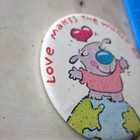 "Love Makes the World Go Round" Humorous Pinback Button Cartoon Dog on Globe — photo 3