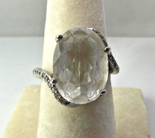 925 amethyst and white topaz ring sz 4.5 wgt 4.31 grams.