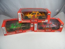 3 NIB 1995 RACING CHAMPIONS NASCAR KODAK, INTERSTATE, MCDONALD'S 1/24 CARS
