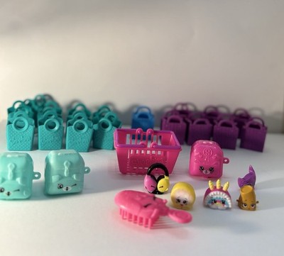 Shopkins Konvolut - 5 Figuren - ein Korb - viele Taschen, lila/türkis -