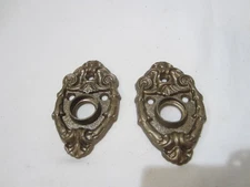 pair antique cast iron or metal back plates for door knob