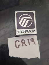MERCURY TOPAZ EMBLEM HOOD??? BIN GR19