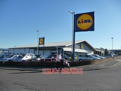 PHOTO  BOURNEMOUTH RINGWOOD ROAD LIDL LIDL ON RINGWOOD ROAD AND A WOMAN PUSHING