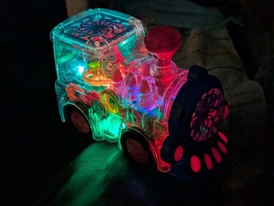 UNBELIEVABLE & EXCITING MULTI-COLORED TRAIN ENGINE W/LIGHTS & SOUNDS 7''L X 3'' W