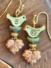 Sweet Gold Bird with Green and Dusty Rose Picasso Leaf Earrings.